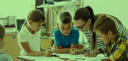 Teacher helping students